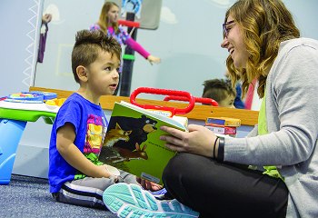 therapist working with a child